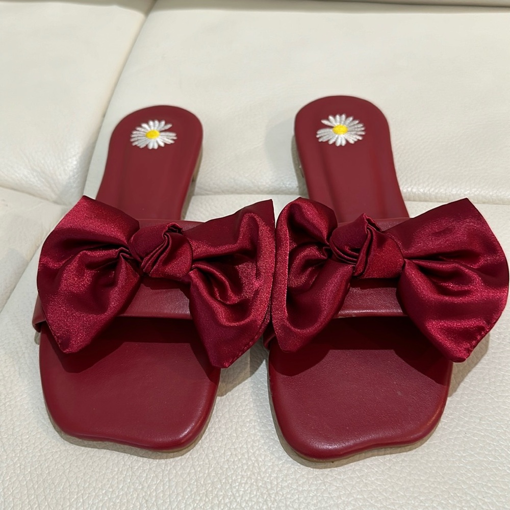 Red Slide Sandal with Big Bow design on the Toe area in size 6